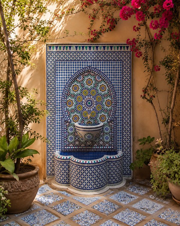 Moroccan zellige fountain design with geometric tilework