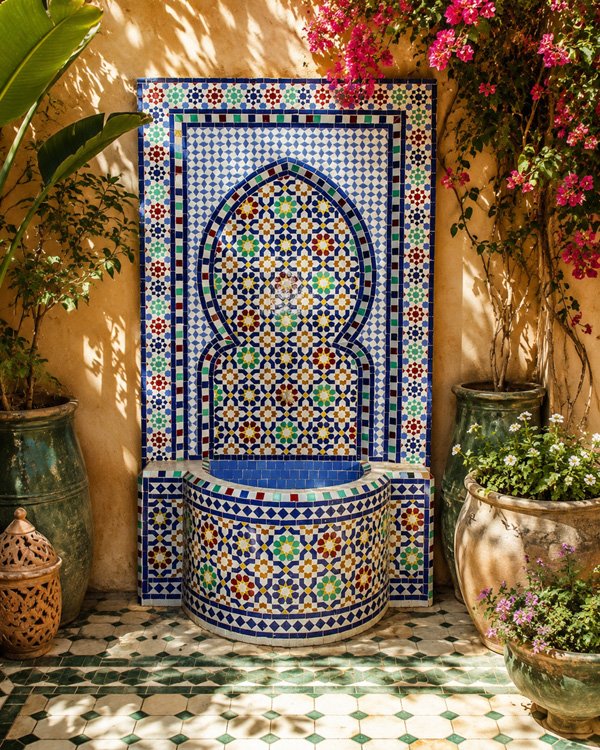 Custom Moroccan fountain with patterned tile border